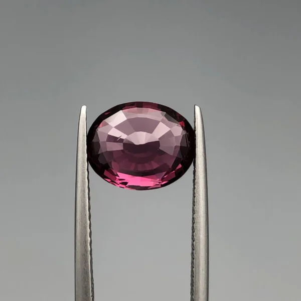 Natural garnet 3.5 carat purplish pink oval gemstone (back side)