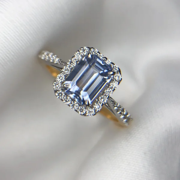 Emerald Cut Sapphire Gold Ring with Diamonds
