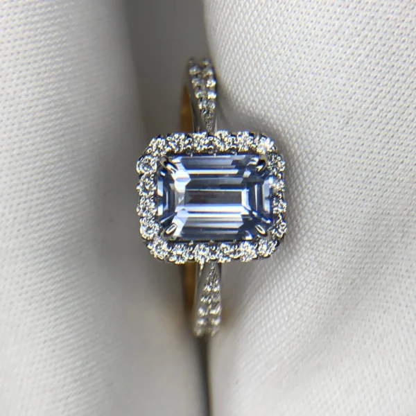 Emerald Cut Sapphire Gold Ring with Diamonds