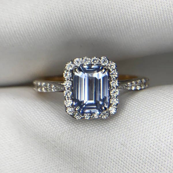 Emerald Cut Sapphire Gold Ring with Diamonds