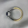 c0c60a41-5f39-4a04-8fc2-991e0bf8d166 Emerald Cut Sapphire Gold Ring with Diamonds